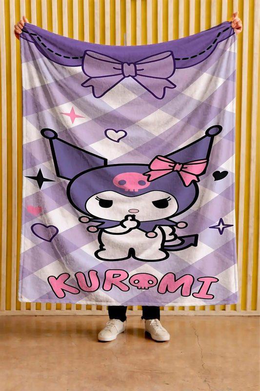 Cobija de Kuromi: Moño · fondo de rombos lila.